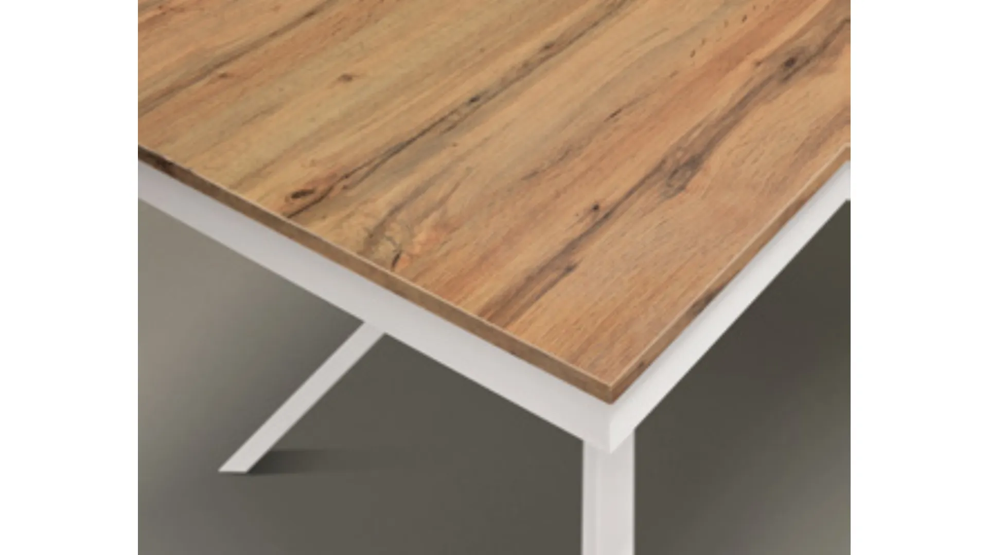 Tavolo versatile con allunga laterale con piano in finitura rovere e basamento centrale bianco